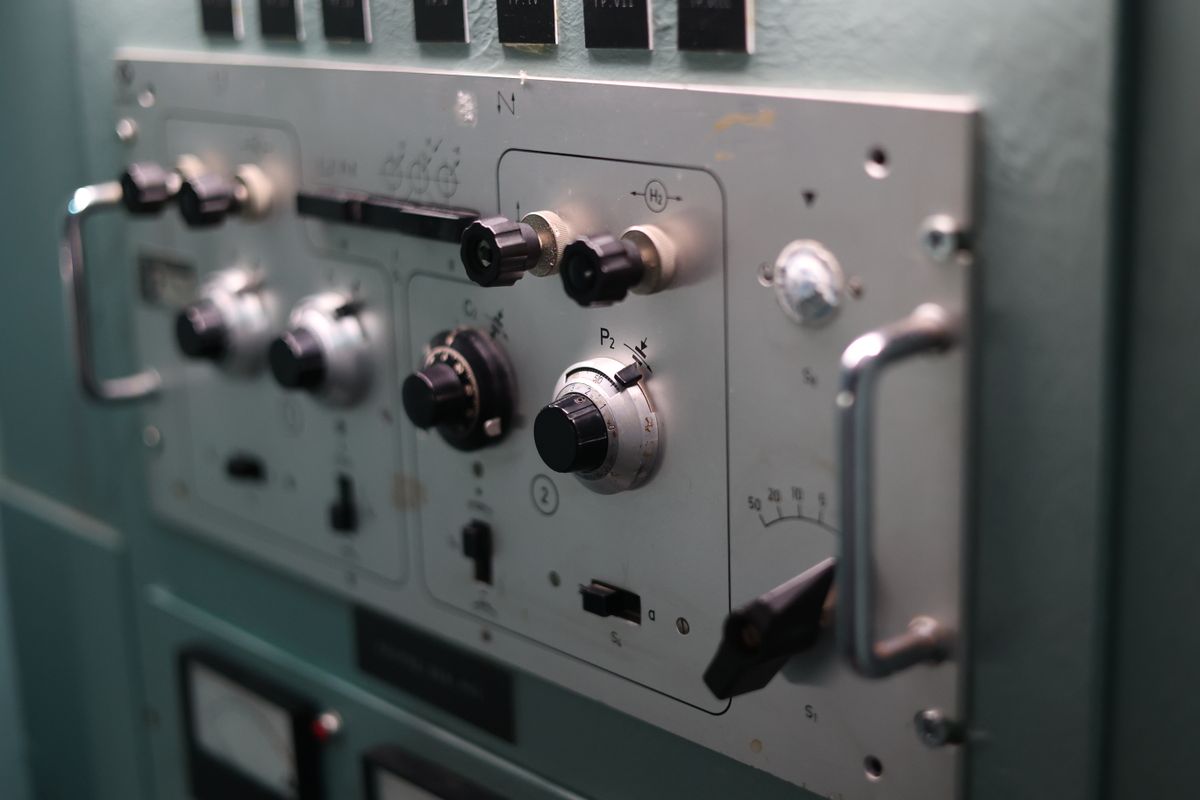 A panel of switches and dials, like the dial on a dimmer light switch