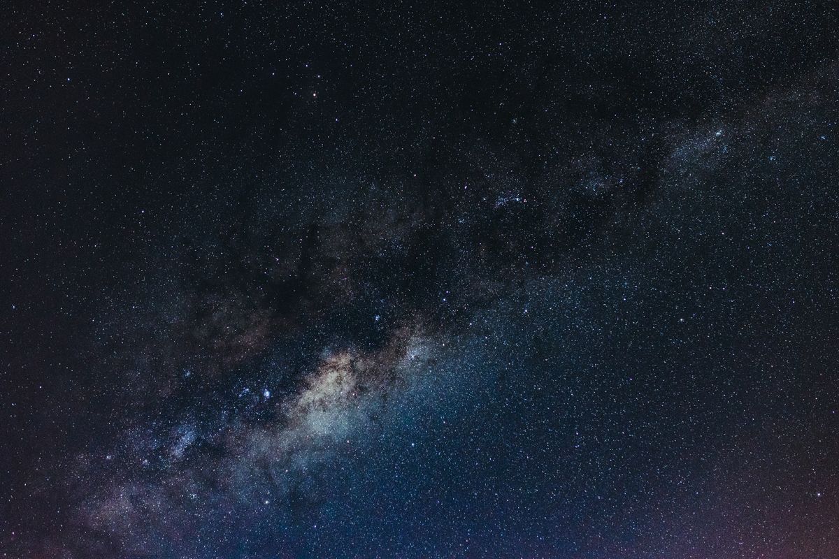 A rich field of stars, representing the first light released across the universe