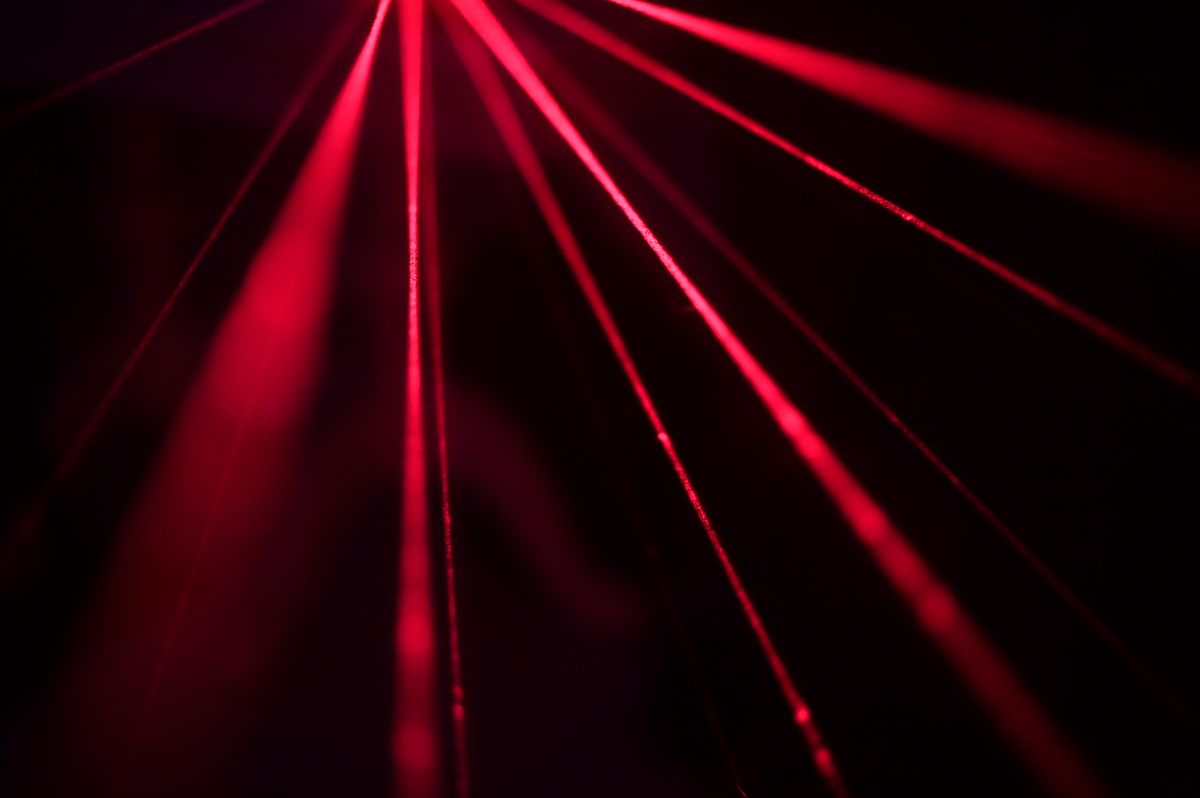 Laser beams travelling in straight, focused lines — light moving in one direction